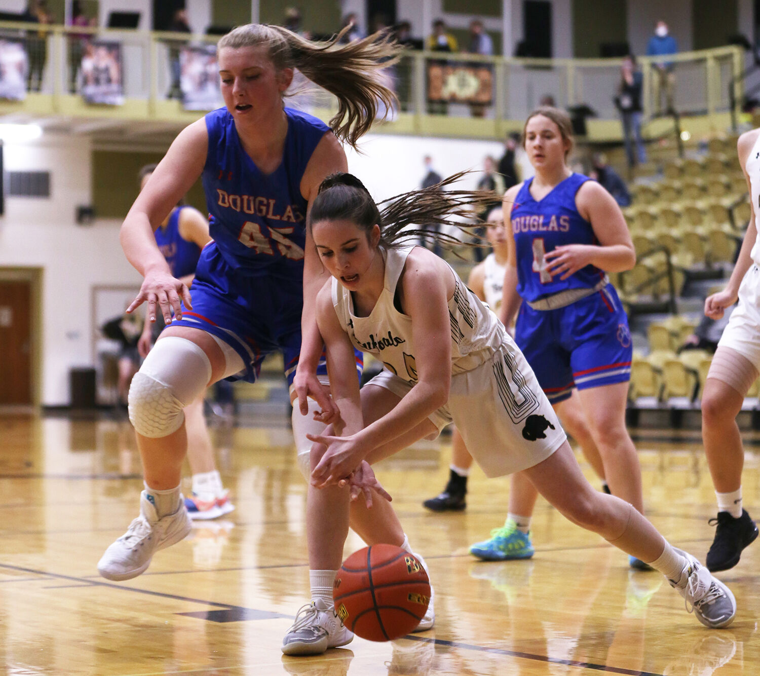 Cassidy Bessler drives underneath Douglas defender Allyson Fertig